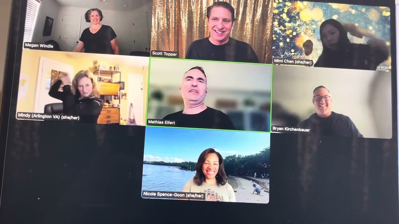 A remote team laughing during a live-hosted virtual event